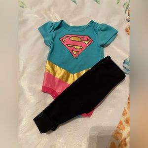 Superwoman bodysuit with black leggings